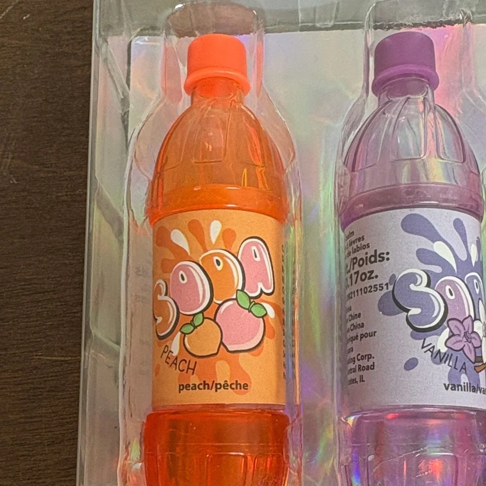 Claire's Soda Bottle Lip Balm Trio - Orange, Purple, Pink